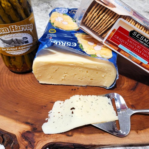 Fresh Cut Danish Esrom Cheese - per lb Fresh Cut Danish Esrom Cheese - per lb